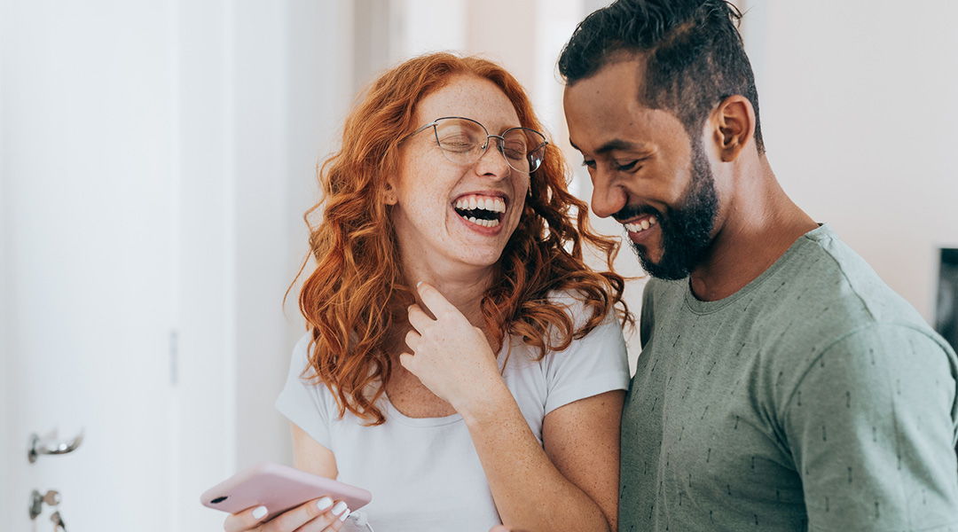 A couple laughing together